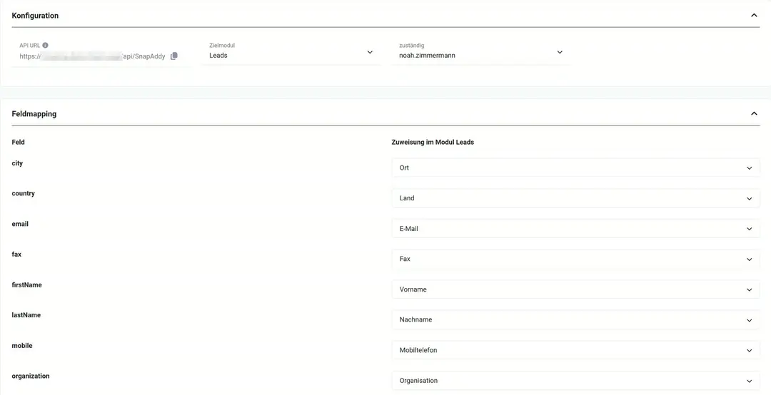 Block „Konfiguration“ mit API URL, Zielmodul Leads und zuständig noah.zimmermann; darunter das Feldmapping mit Zuweisung im Modul Leads, etwa firstName → Vorname, lastName → Nachname, organization → Organisation